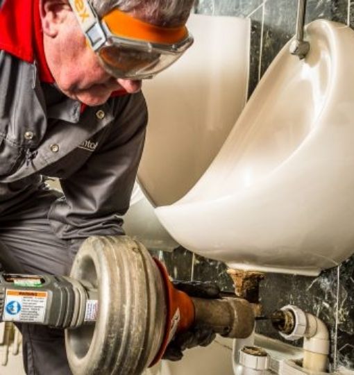 Technician carrying out deep cleaning and coring